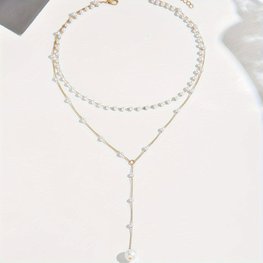 Perles en Cascade – Collier à Pampilles Vintage