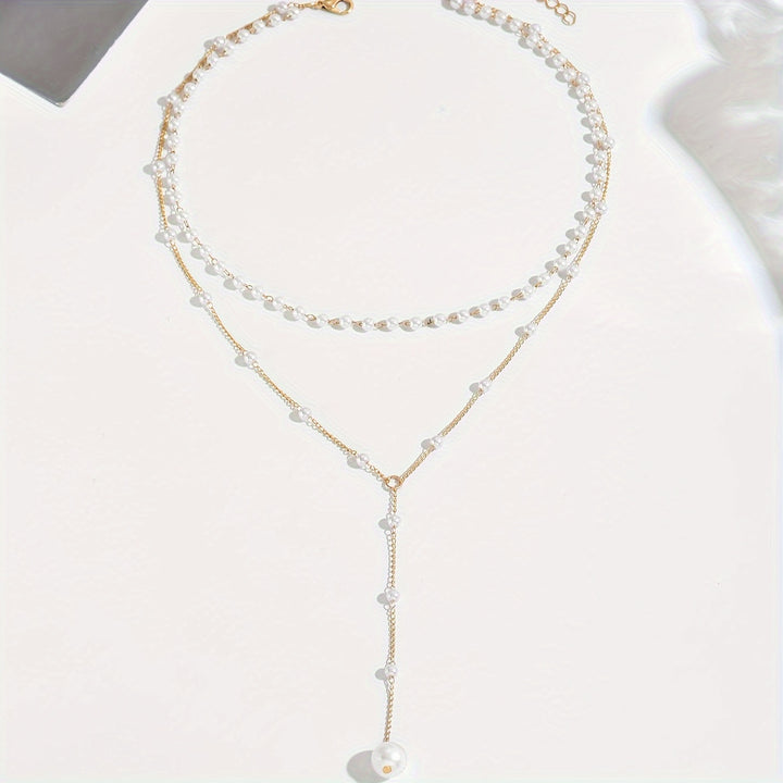 Perles en Cascade – Collier à Pampilles Vintage