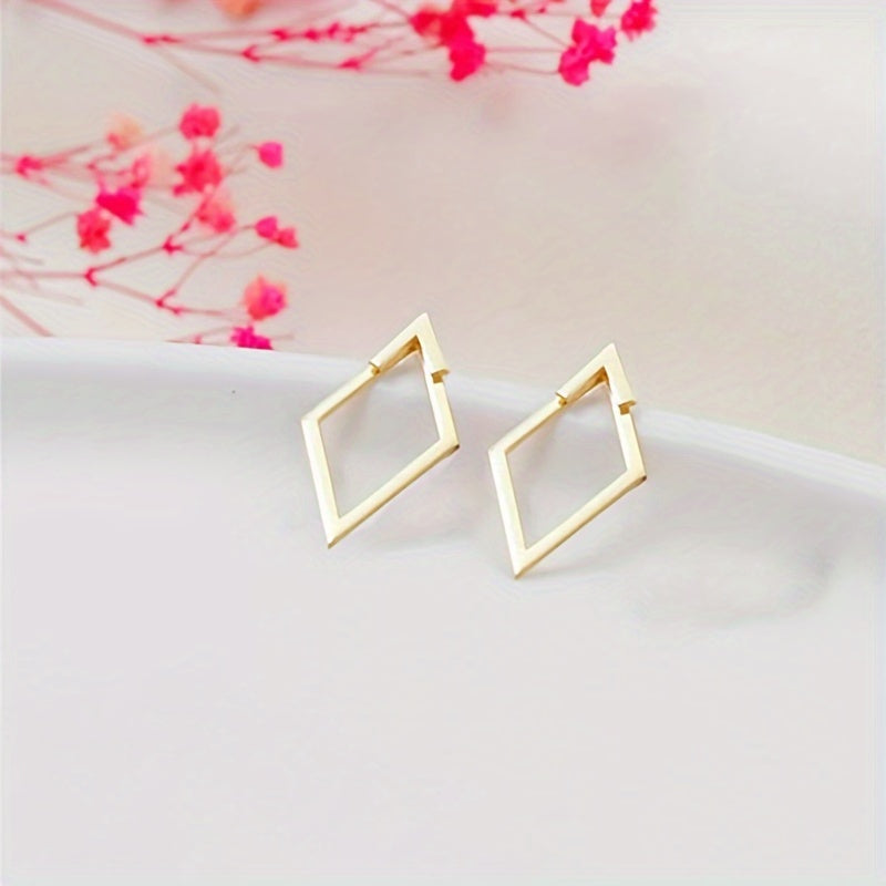 Épure Dorée – Boucles d’oreilles ajourées bohème