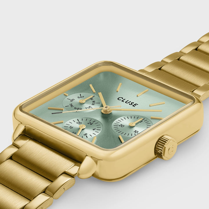 La montre multifonction Tétragone en acier, vert sauge, couleur or