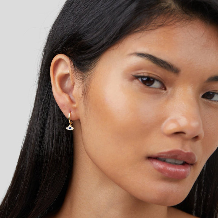 Pendantes d'oreilles avec motif œil bleu