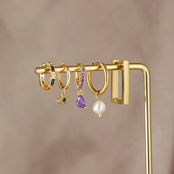 Pendantes d'oreilles avec motif œil bleu