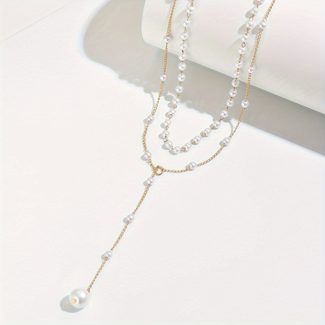 Perles en Cascade – Collier à Pampilles Vintage