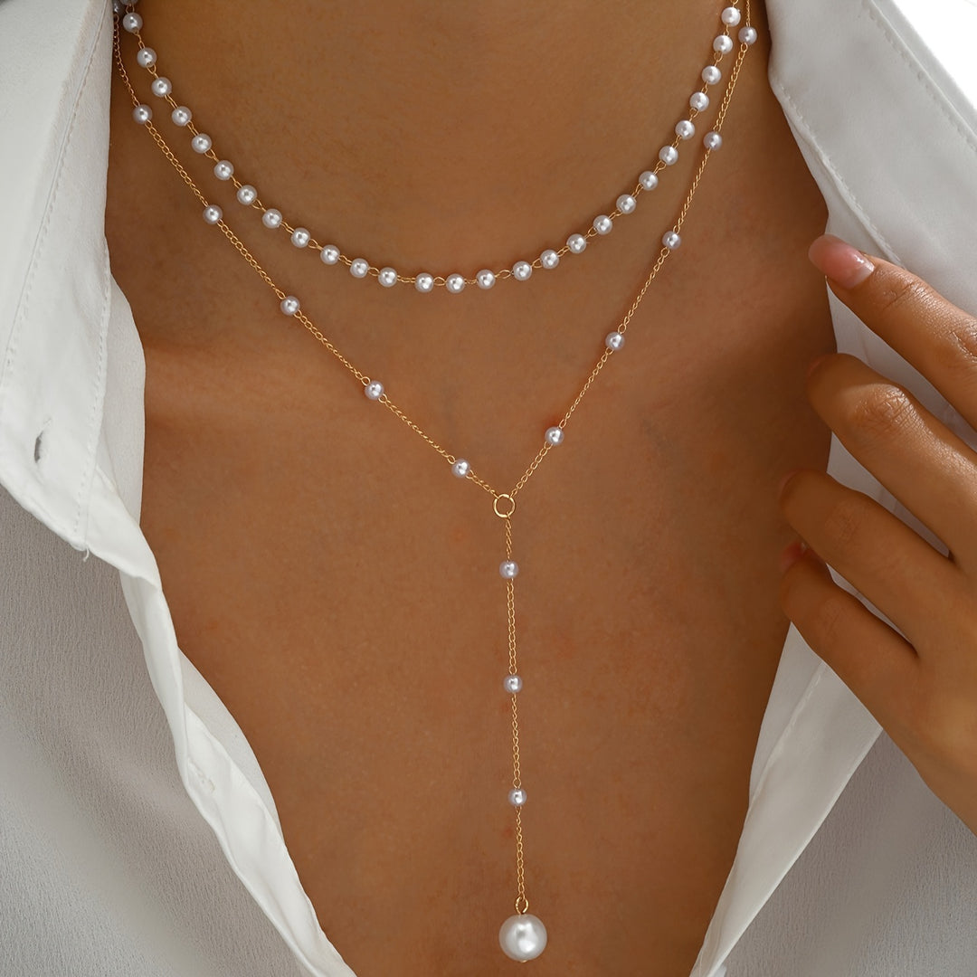 Perles en Cascade – Collier à Pampilles Vintage