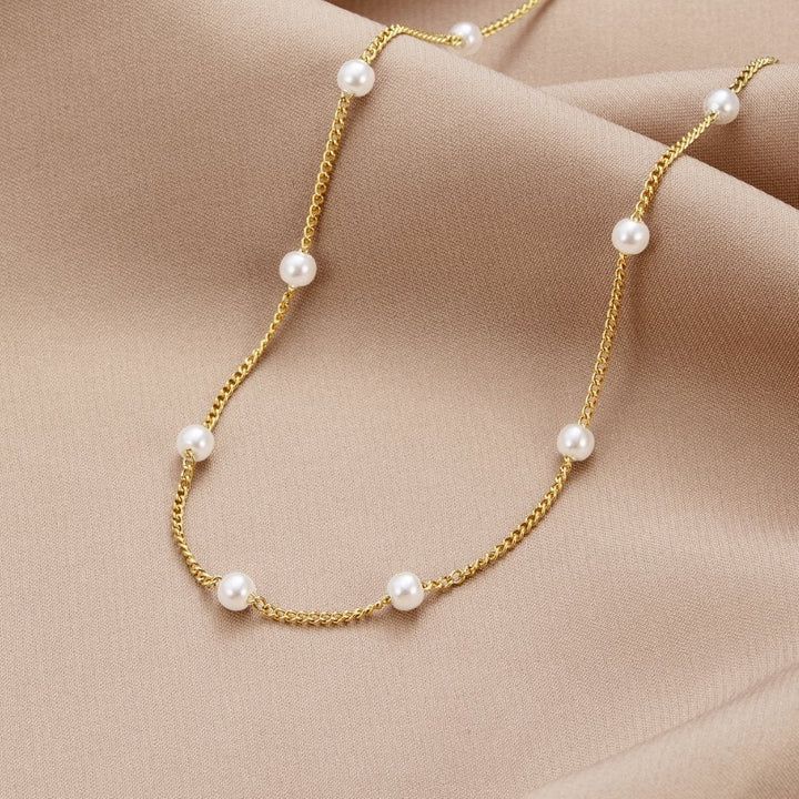 Collier en perles d'or pur