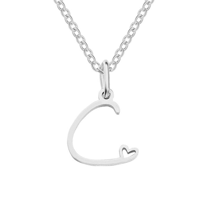 Collier en argent en forme de cœur avec initiale